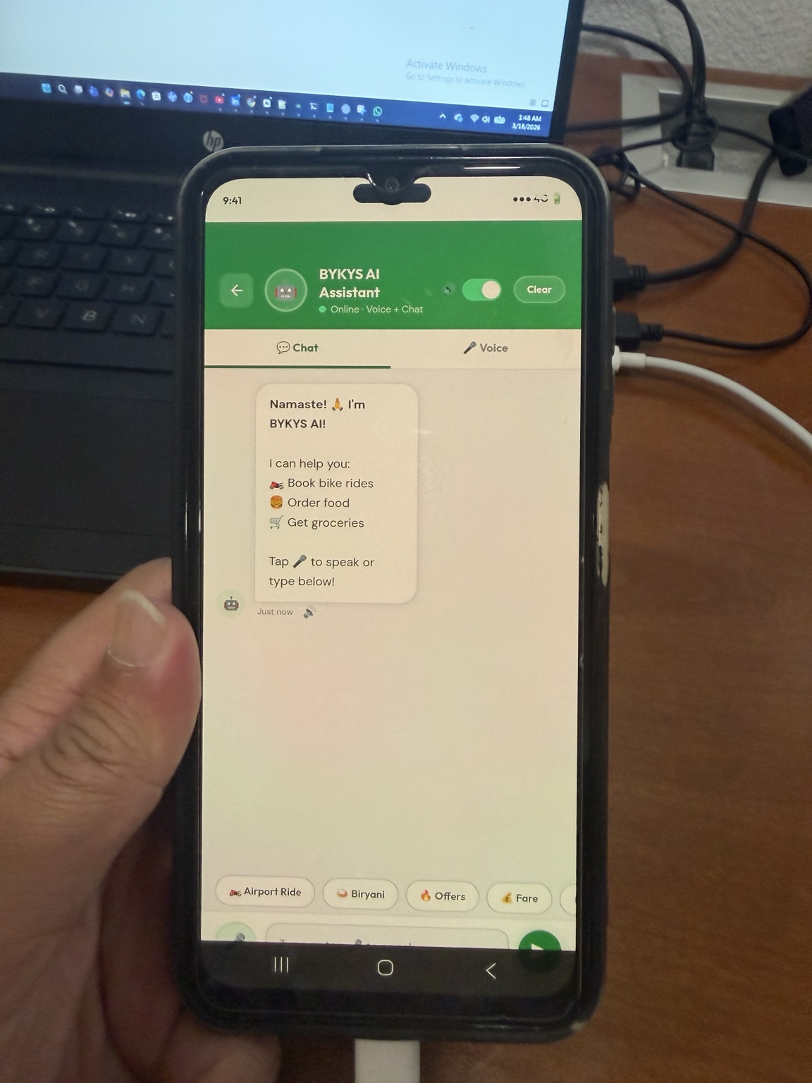 BYKYS AI assistant chat screen helping a user book rides, order food, and get groceries